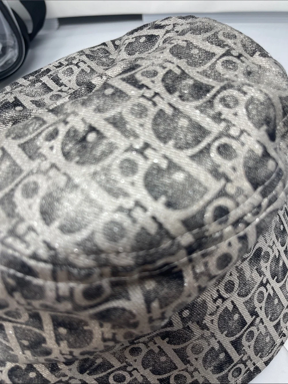 Fashion monogram bucket hat with gold and metallic gray accents & Clear bag